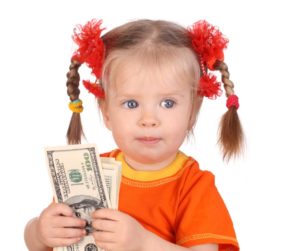 baby girl with money in hand self-made